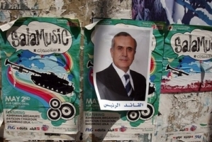 A photo of Lebanese Army General Michel Sleiman is plastered on a wall in Beirut on May 22. Sleiman is set to be elected Lebanon's president this weekend following a breakthrough deal between the country's Western-backed majority and the Hezbollah-led opposition backed by Syria and Iran. (AFP/Patrick Baz)